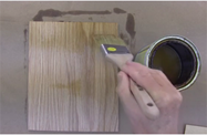 Brush in the direction of the grain and apply thin coats of finish